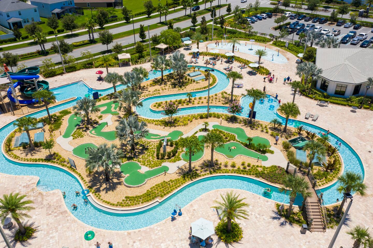 Aerial view of resort lazy river, mini golf, and splash pad